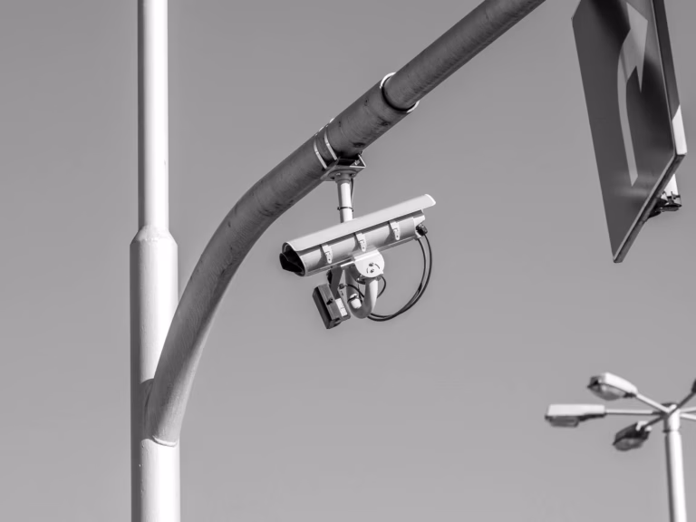 Automated camera systems detect speeding violations and record vehicle data for enforcement review