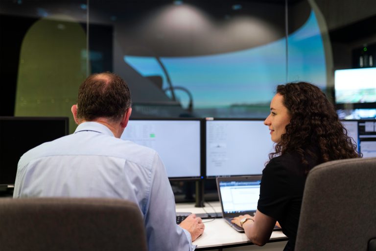 Siemens CTO Takes over PassiveLogic as Autonomous Buildings Move from Premium to Standard 1 control room with multiple monitors showing building systems data