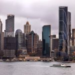 A futuristic city skyline with integrated transportation systems