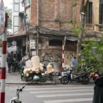 Modern city street with a diverse mix of public and private transportation