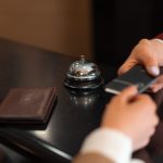 hospitality staff using technology to serve guests