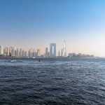 Stock waterfront view of Dubai skyline and Ain Dubai on Bluewaters Island